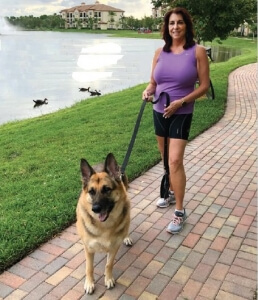 Kathy walking her German Shepherd 