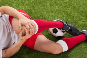 Soccer player with knee injury