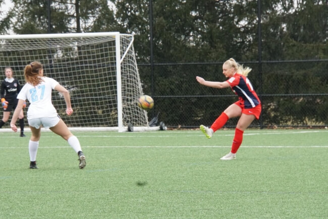 Taylor Sammons playing soccer