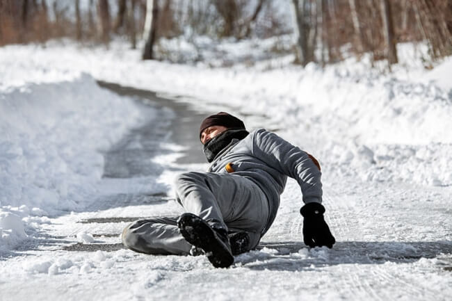 Man falling on winter ice