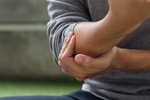 Man with elbow pain