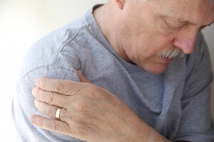 Man suffering from shoulder pain
